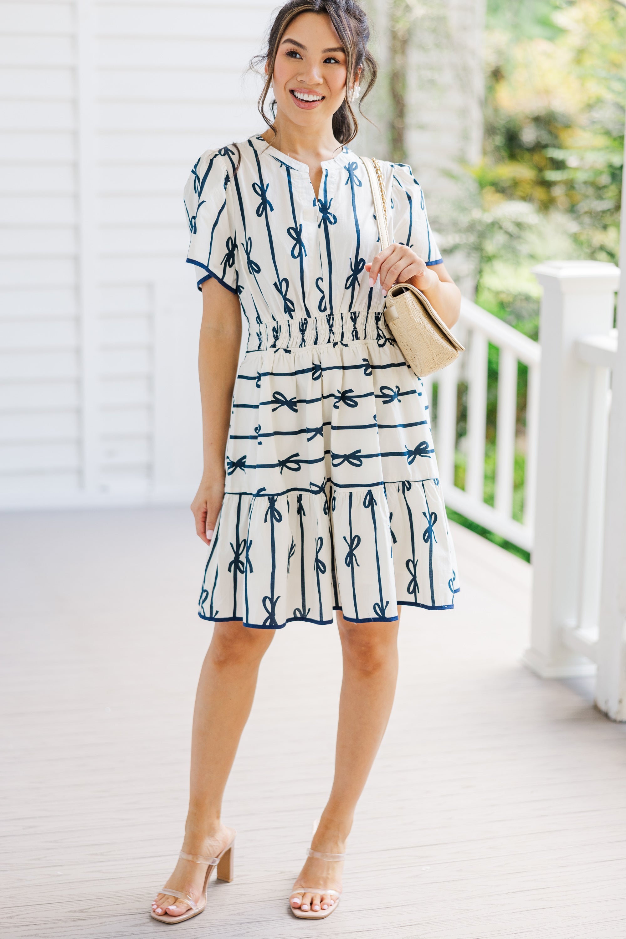 Charming Off-White Ribbon Printed Dress: A Must-Have!