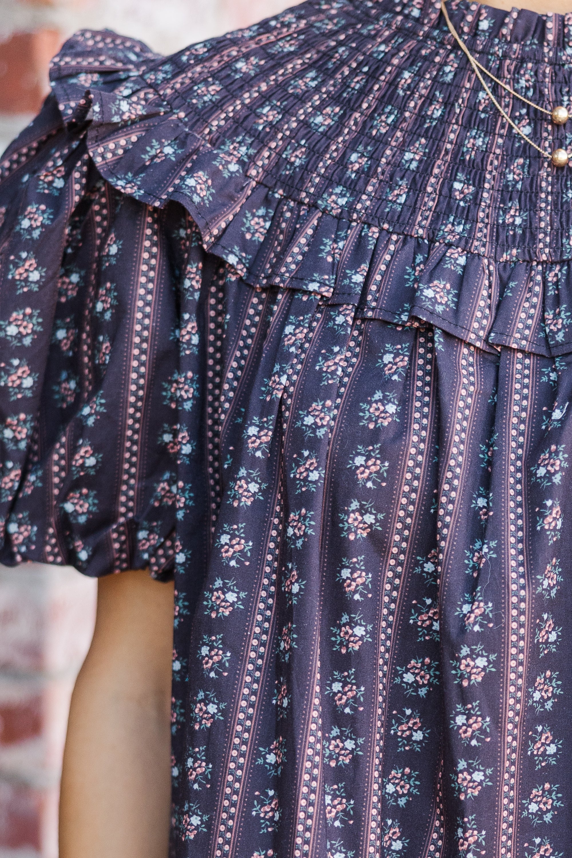 Aureum: Unforgettable Black Ditsy Floral Babydoll Blouse