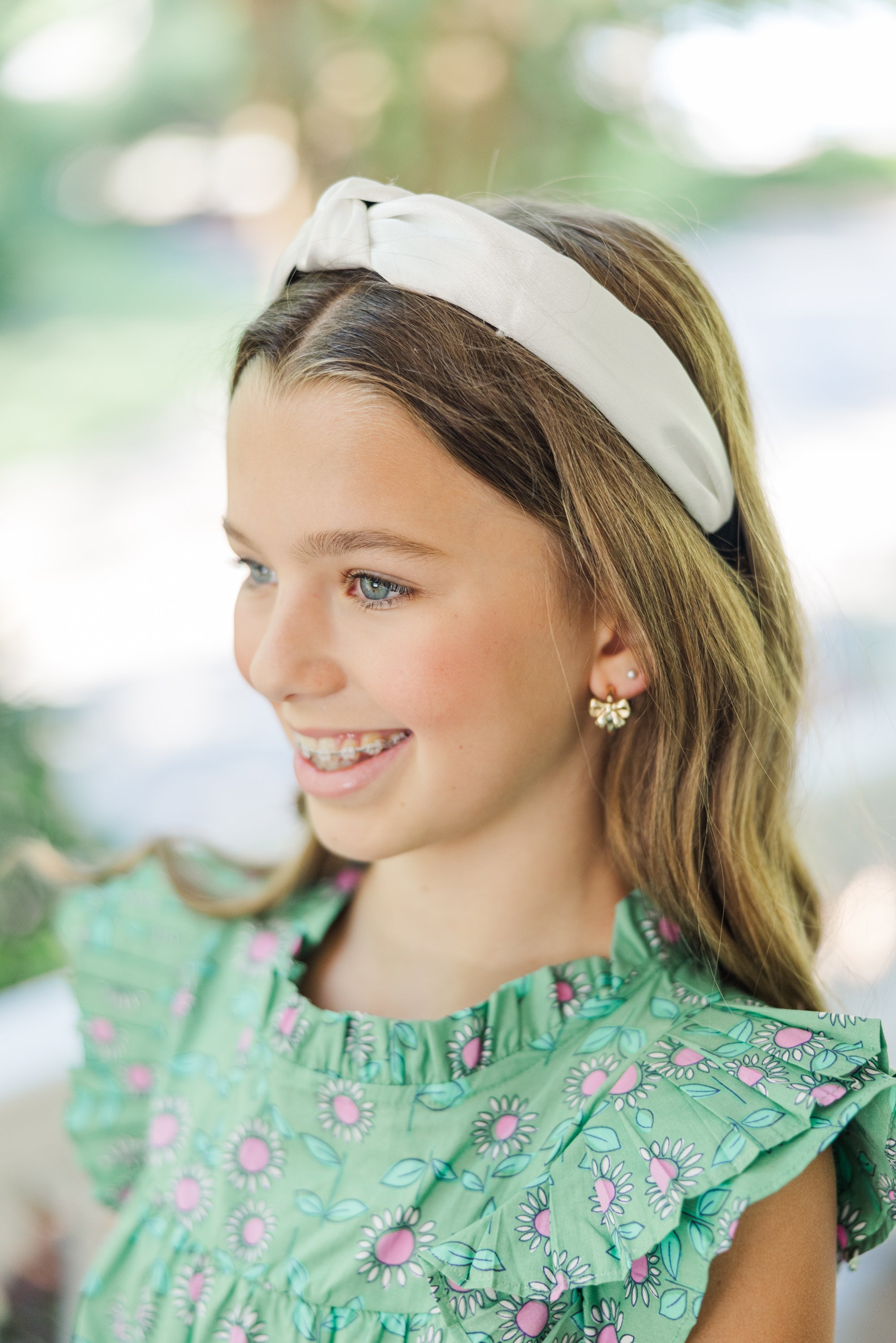 Girls' White Satin Knotted Headband: Stand Out Everywhere!