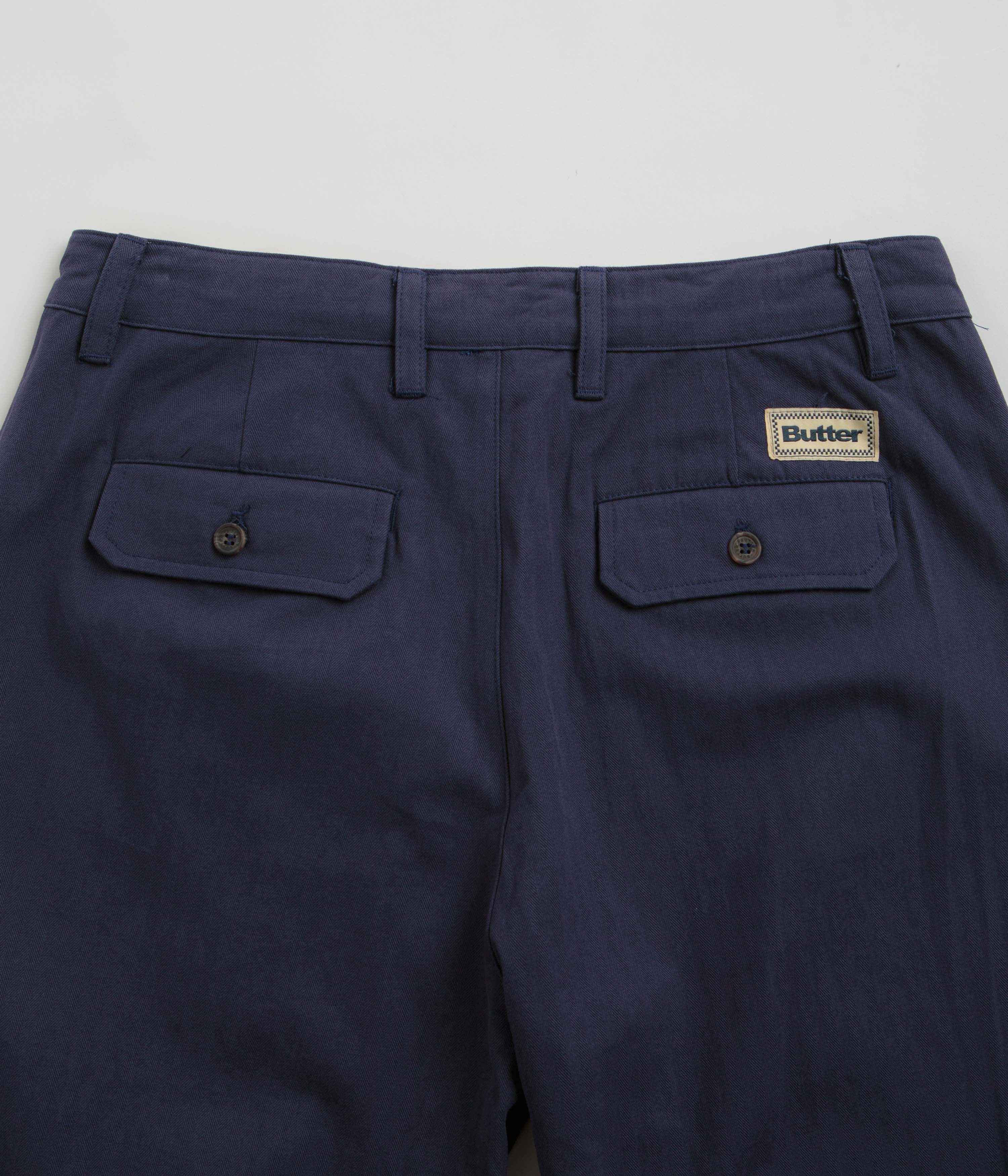 Navy Butter Goods Pleated Trousers - A Must - Have Fashion Item