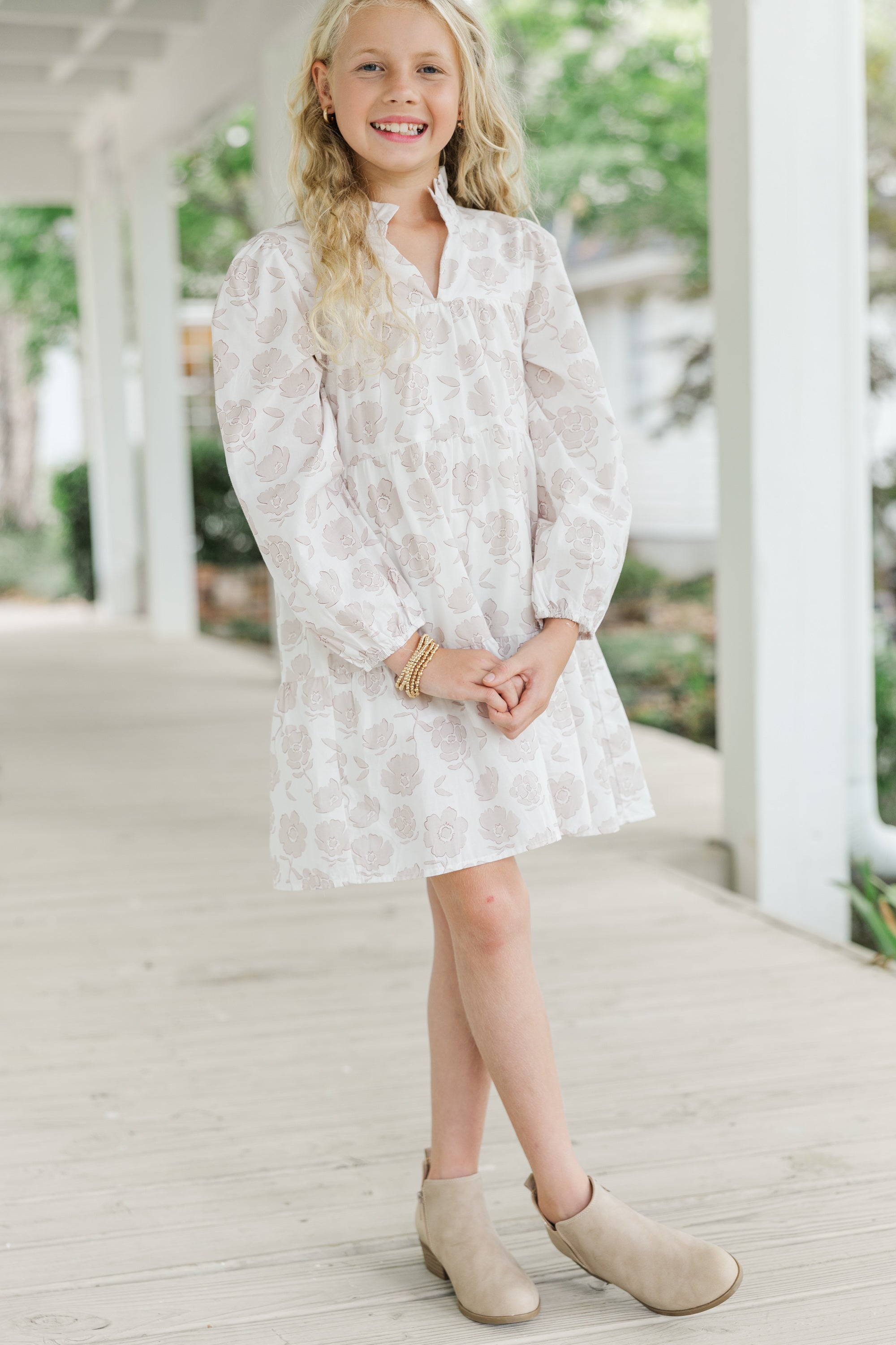 Girls' Off-White Floral Babydoll Dress: A Must-Have!