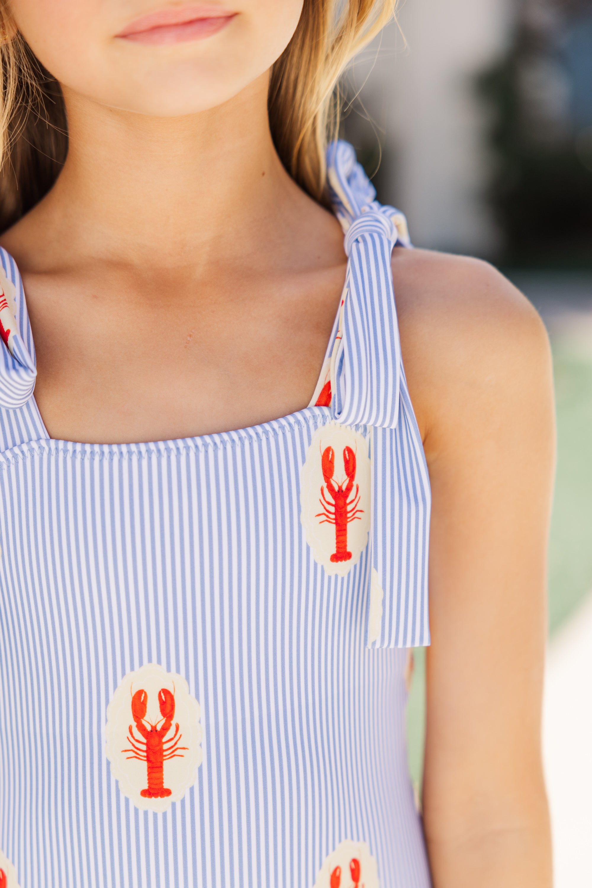 GIRLS' MUST-HAVE: PREORDER THE COURTNEY BLUE LOBSTER MEDALLION ONE-PIECE SWIMSUIT NOW!