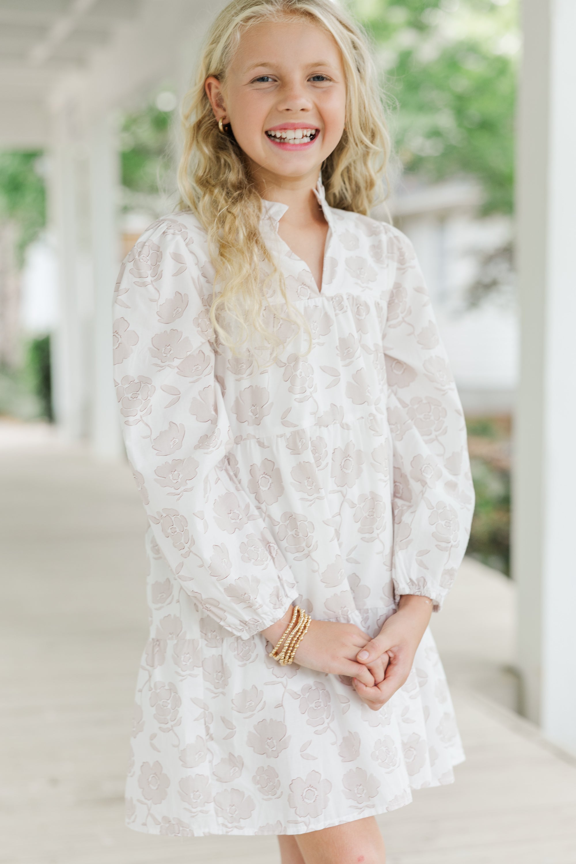 Girls' Off-White Floral Babydoll Dress: A Must-Have!