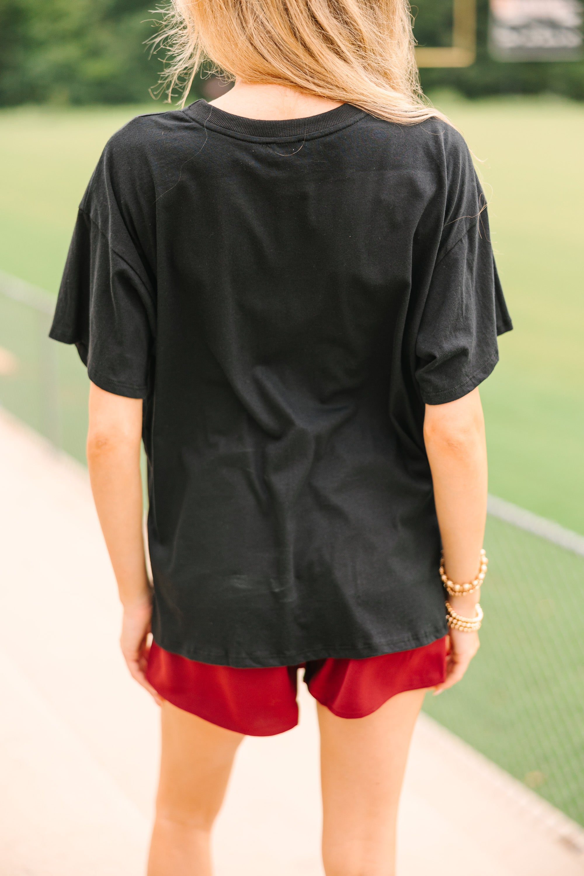 Exciting Gameday Black Graphic Tee: Your Must - Have for Game Days!