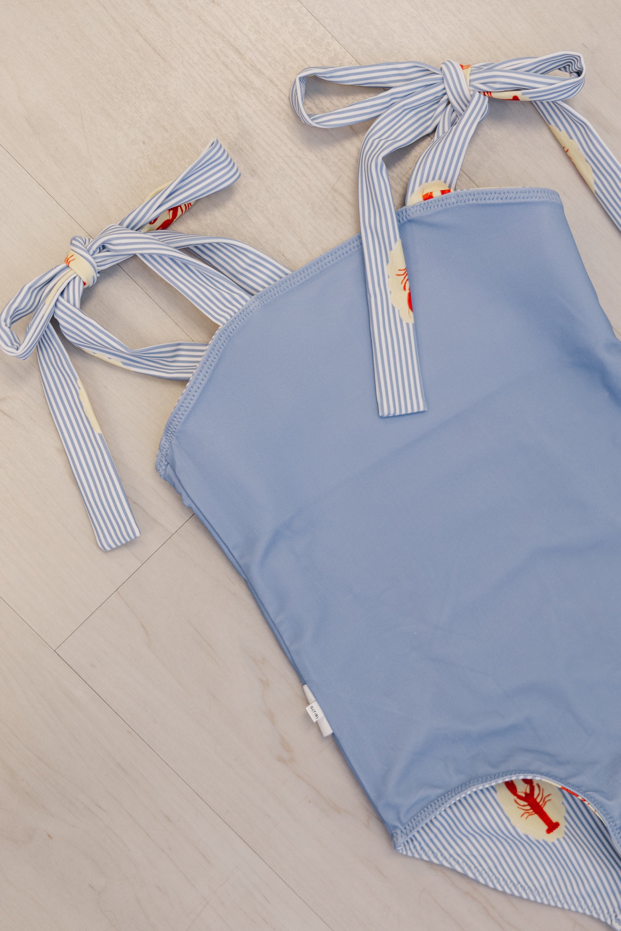 GIRLS' MUST-HAVE: PREORDER THE COURTNEY BLUE LOBSTER MEDALLION ONE-PIECE SWIMSUIT NOW!