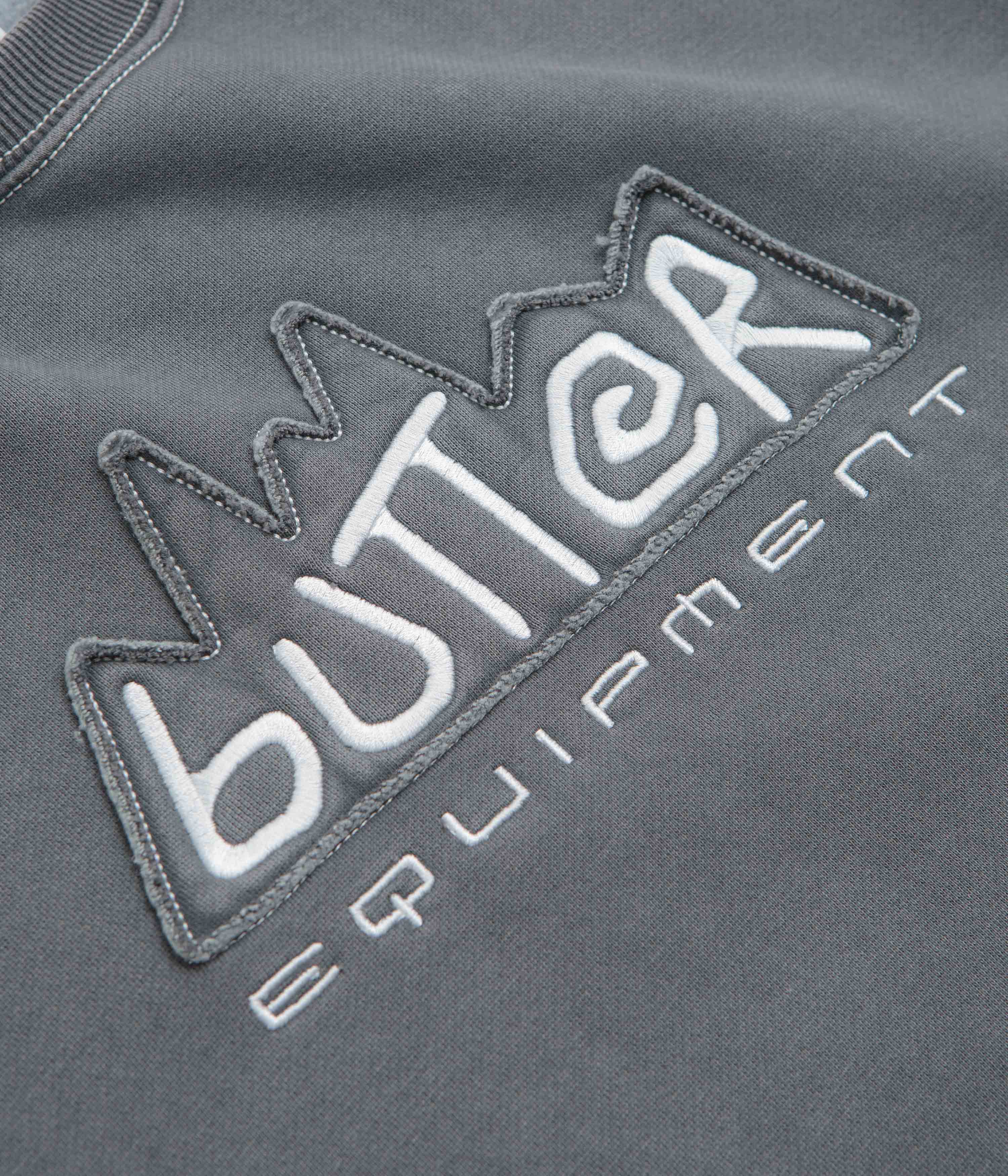 Butter Goods' Stunning Washed Black Equipment Applique Crewneck Sweatshirt