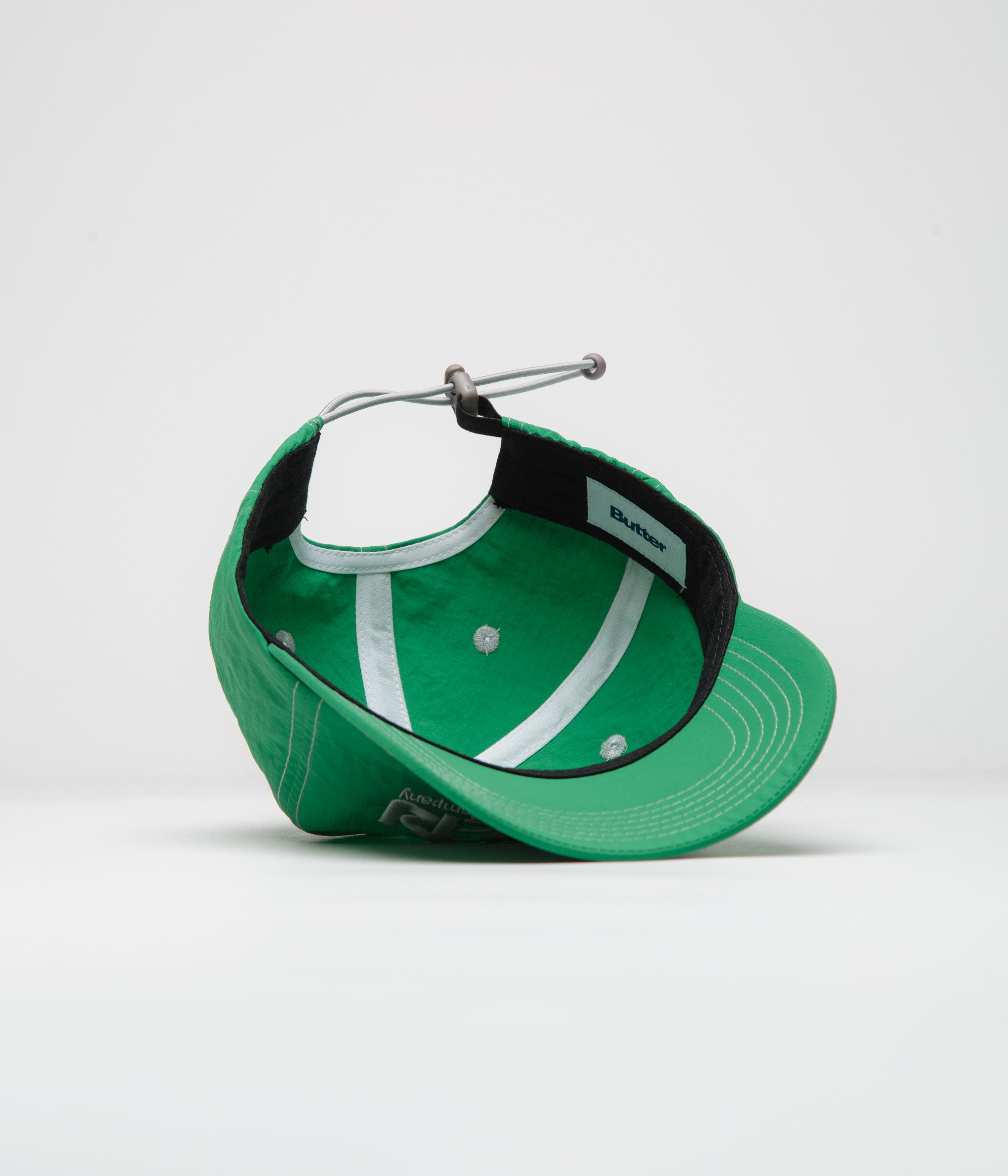 Stylish Green Butter Goods Design Cap - Stand Out Now!