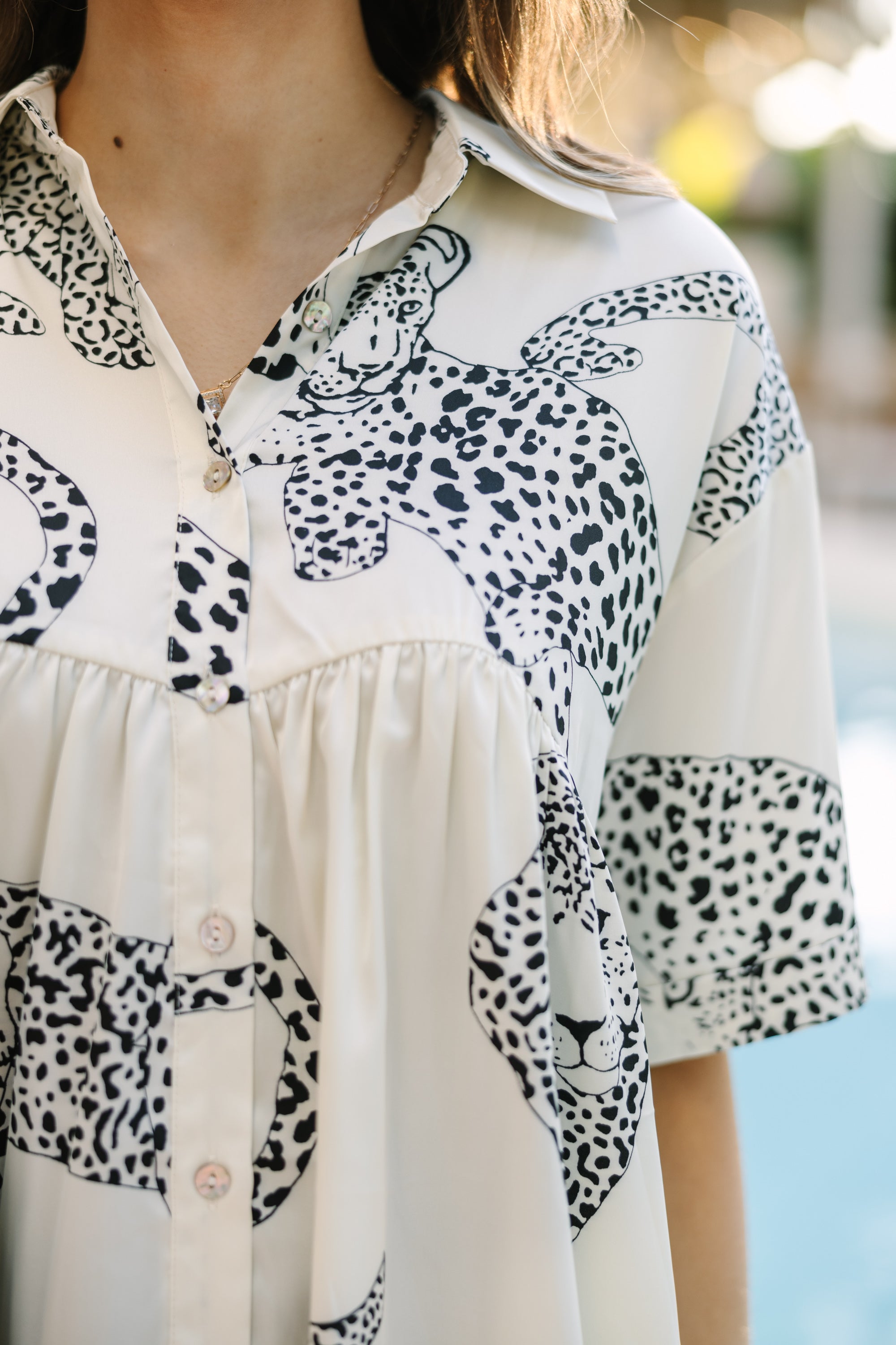 Gorgeous Cream White Leopard Print Babydoll Top - A Wild Fashion Must-Have!