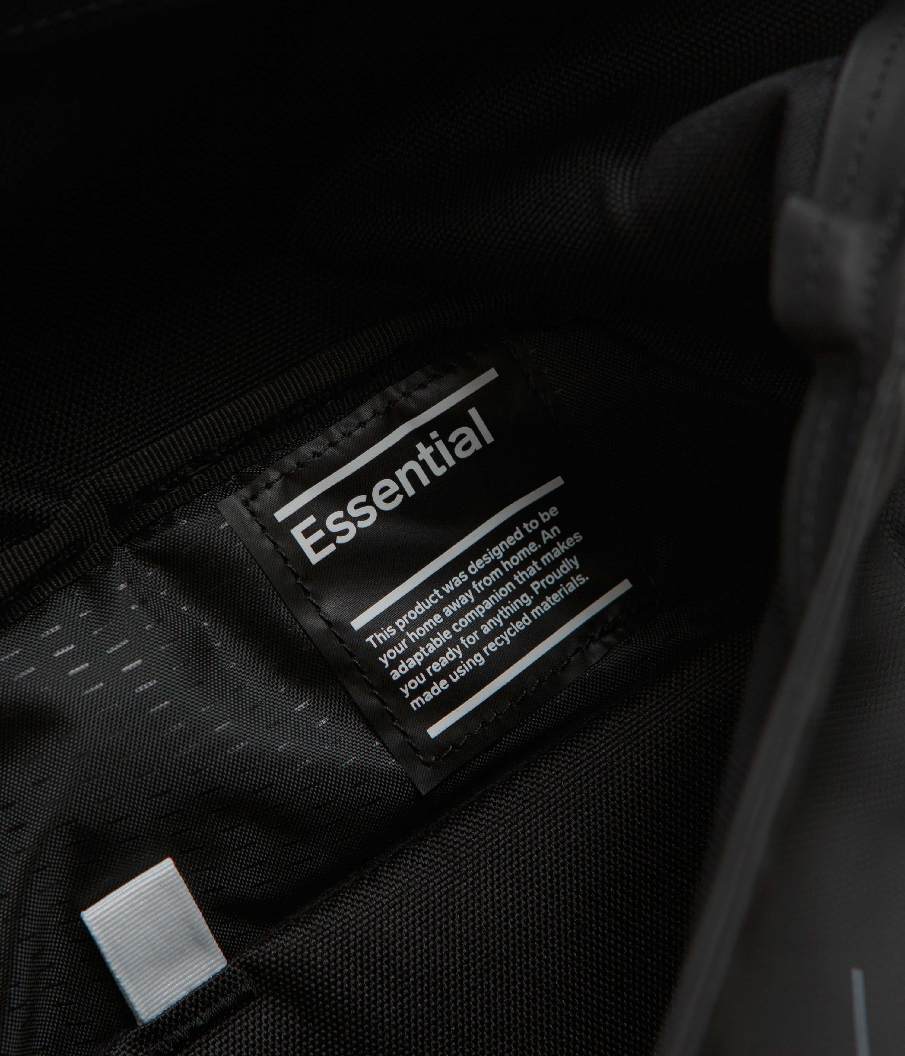 D_b_ Essential 12L Black Out Backpack - Stylish and Functional