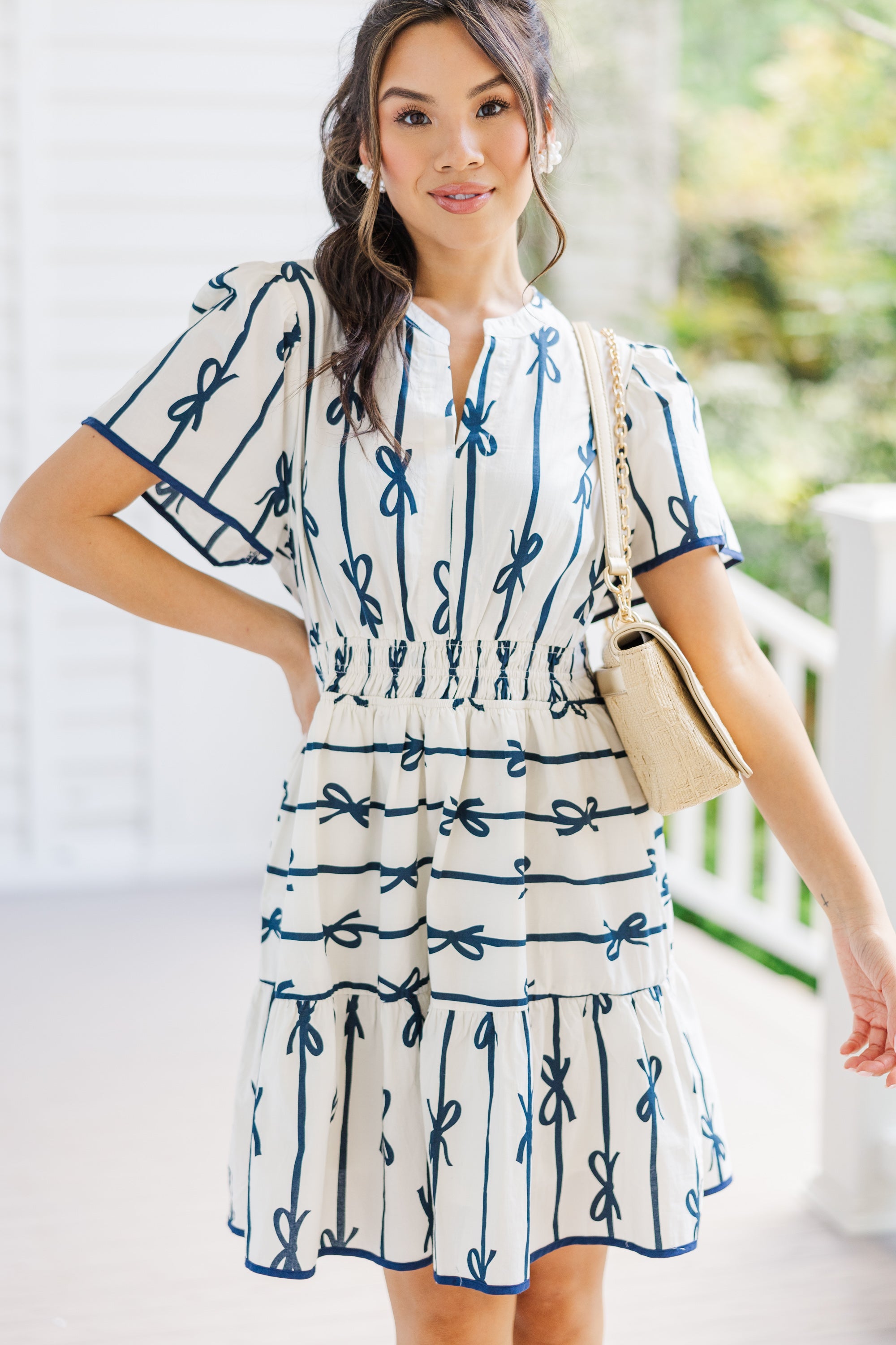 Charming Off-White Ribbon Printed Dress: A Must-Have!