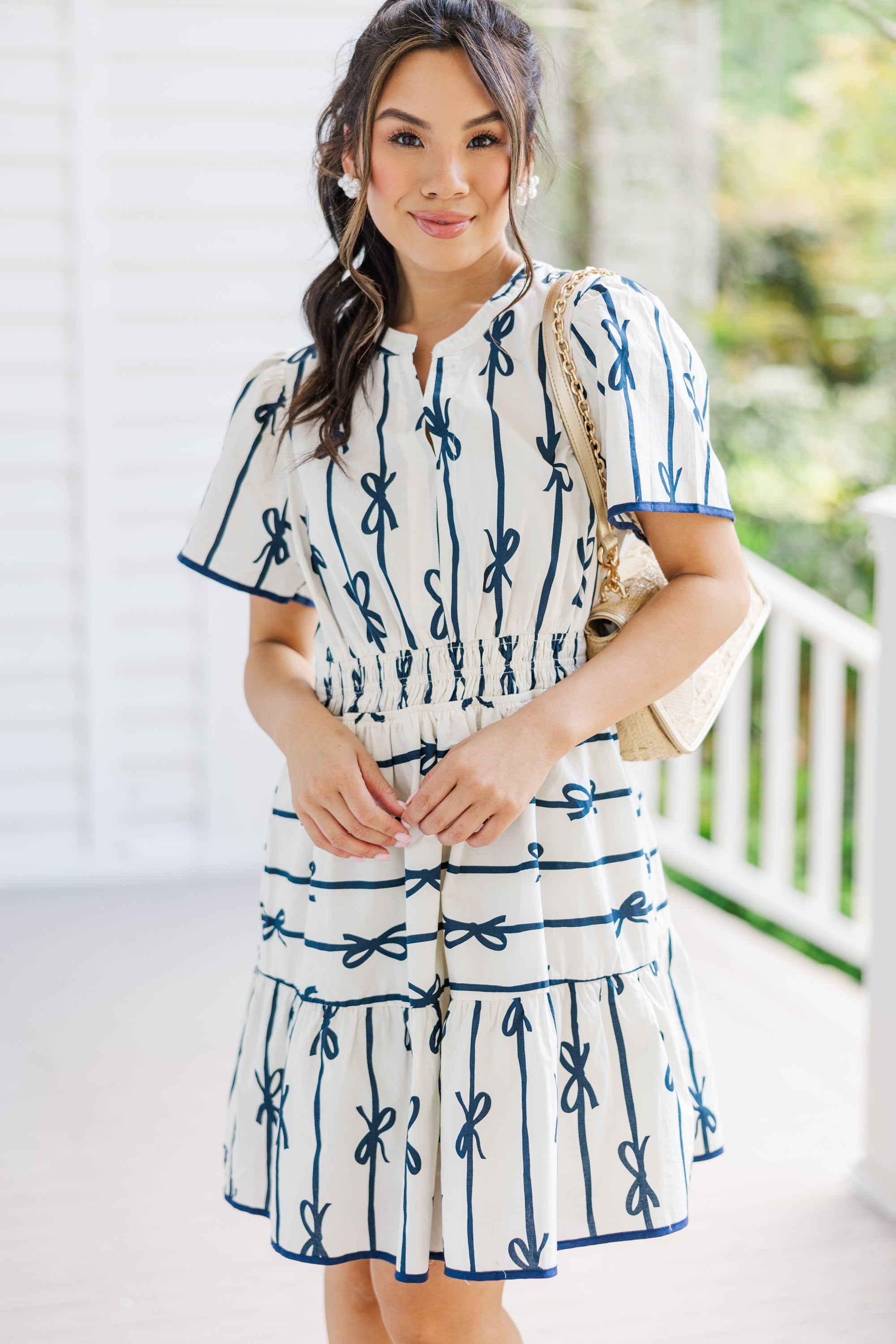 Charming Off-White Ribbon Printed Dress: A Must-Have!