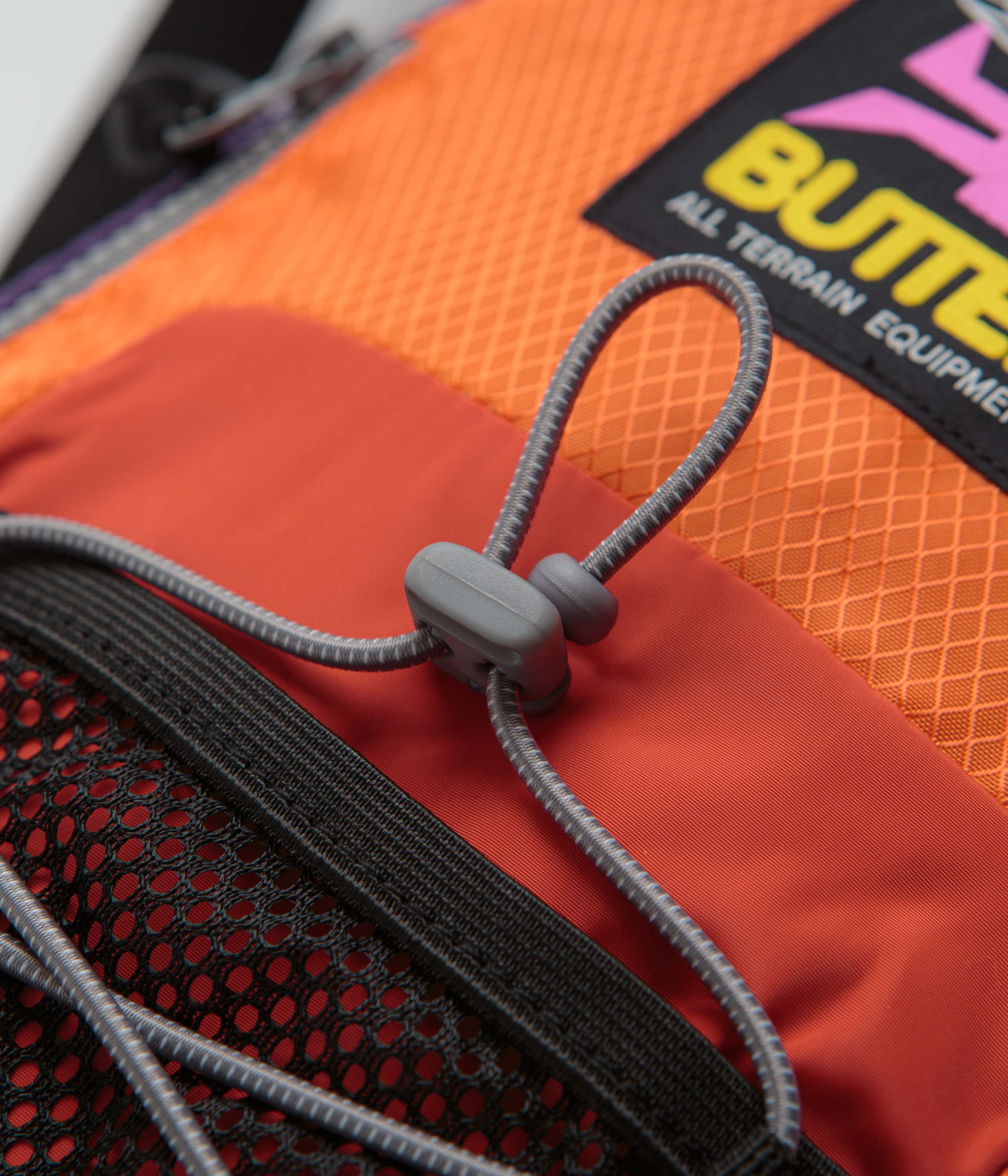 Butter Goods Express Orange/Navy Shoulder Bag - A Must-Have!