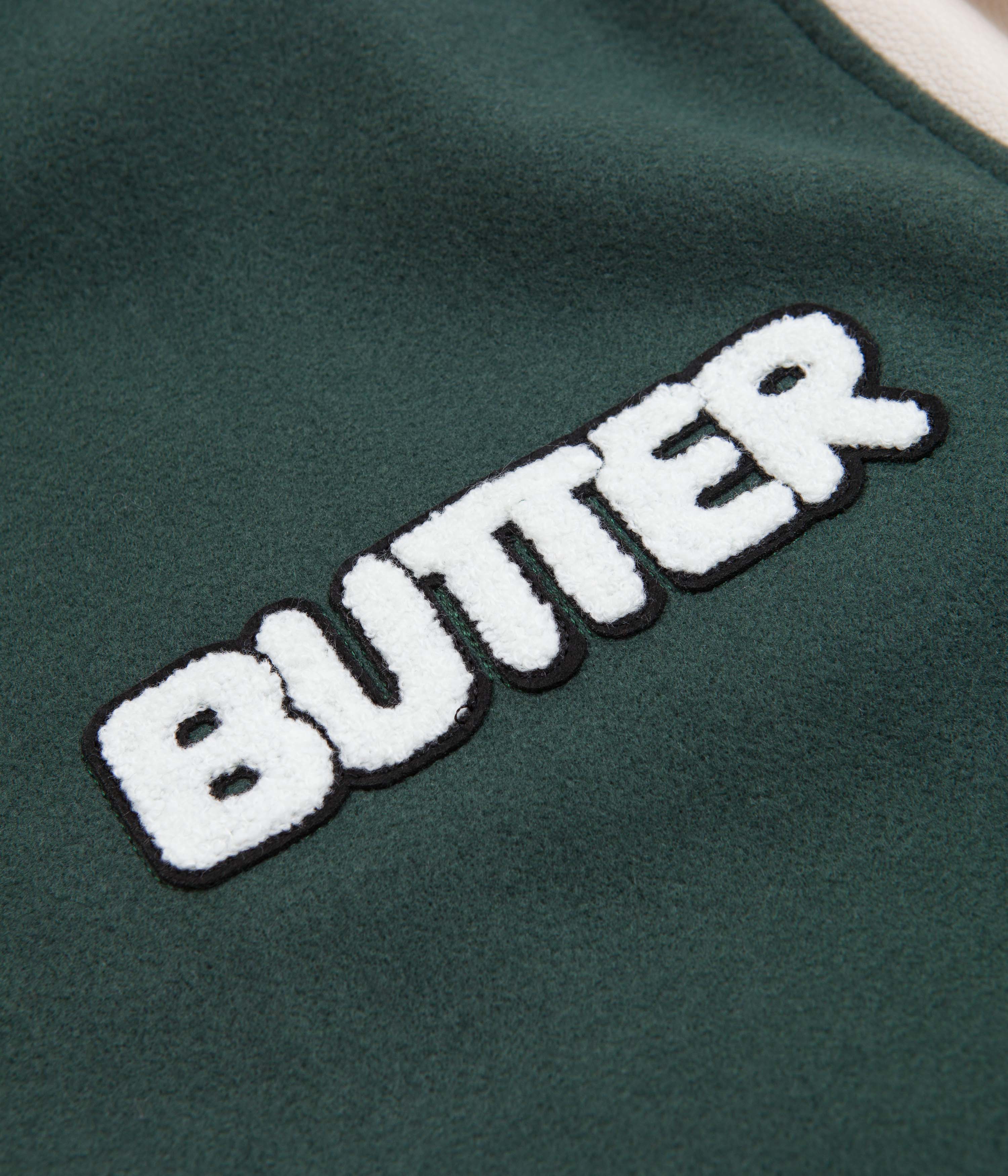 Butter Goods Forest Green World Peace Varsity Jacket - A Stylish Statement Piece