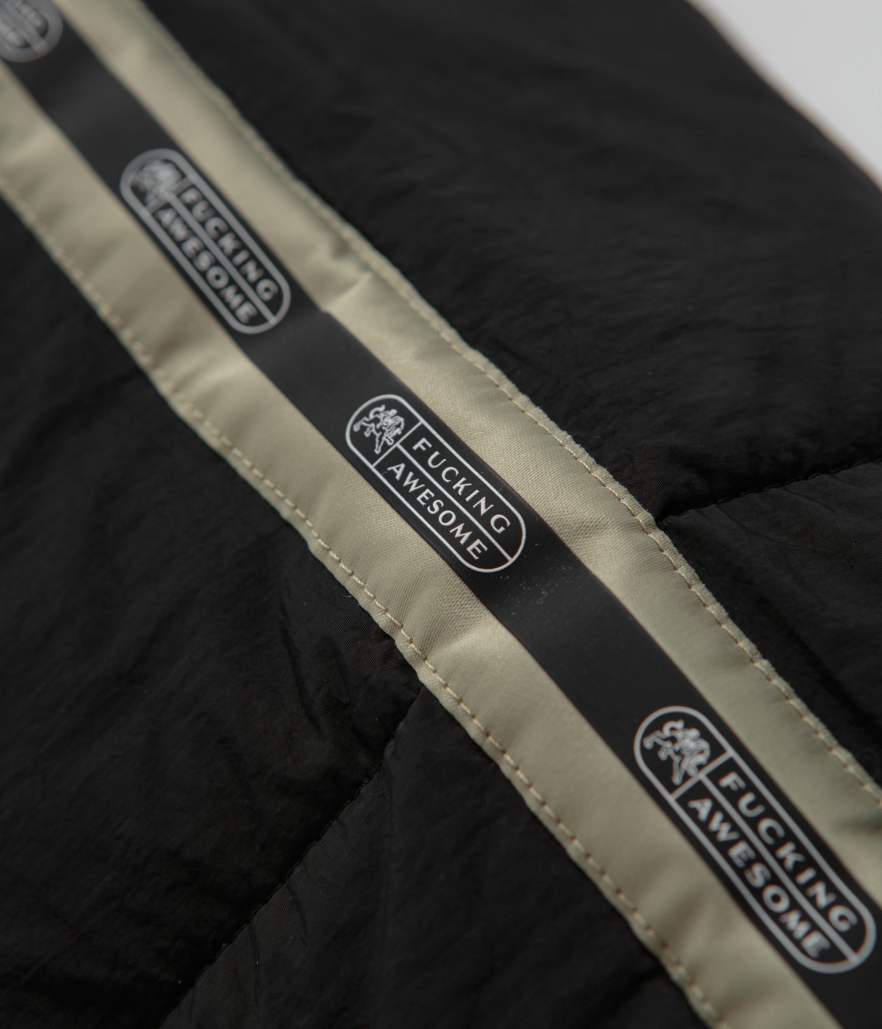 Fucking Awesome Dill Racing Black Puffer Jacket - A Skateboarding Essential