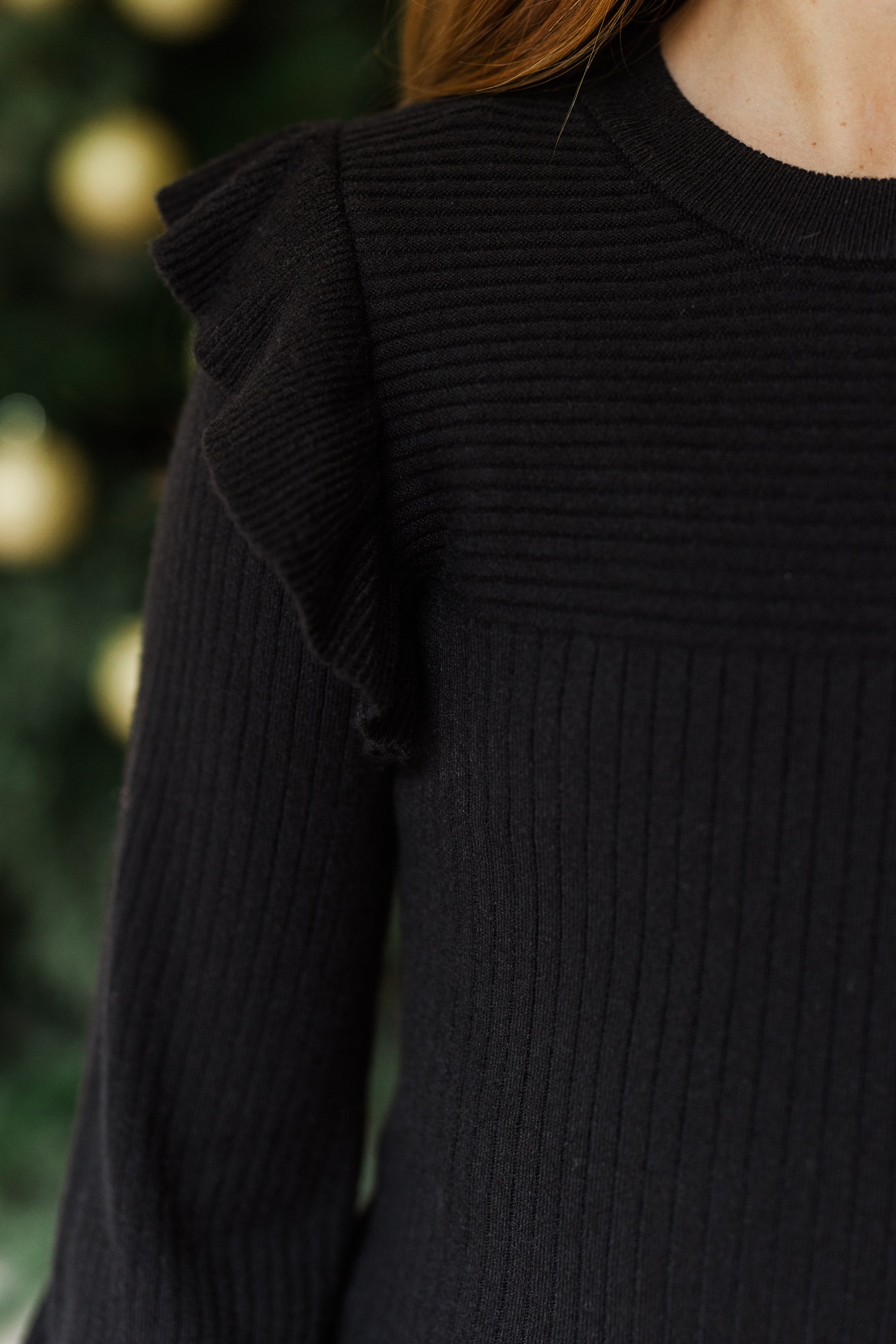 Girls' Stunning Black Ruffled Sweater - Reach for Style!