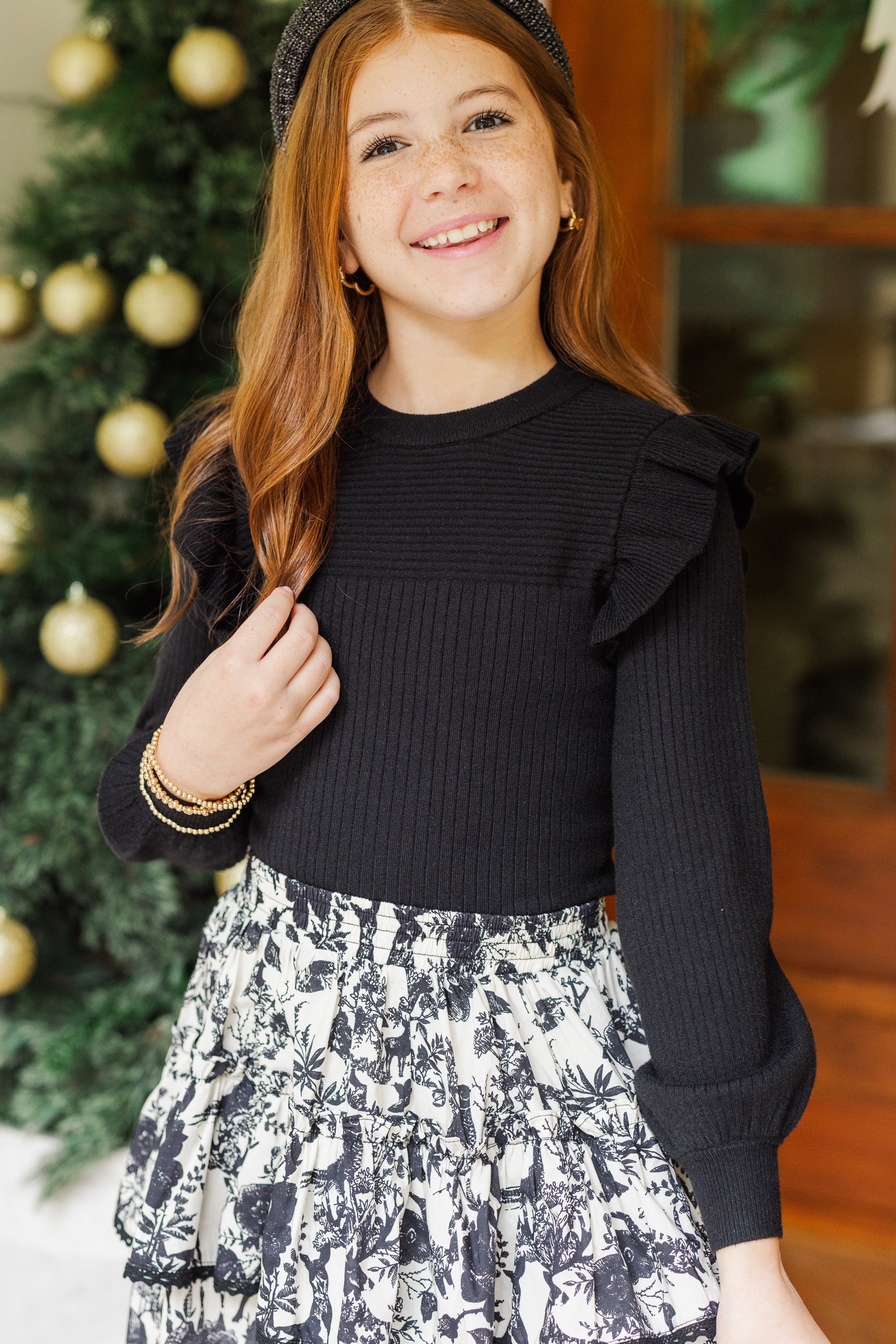 Girls' Stunning Black Ruffled Sweater - Reach for Style!
